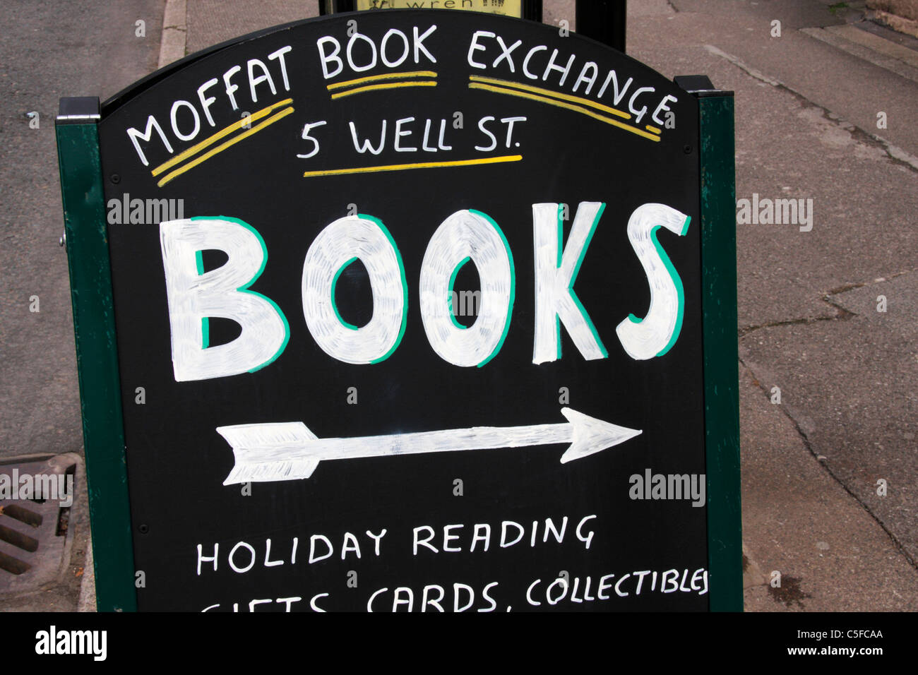 Books sign outside independent bookseller. Stock Photo