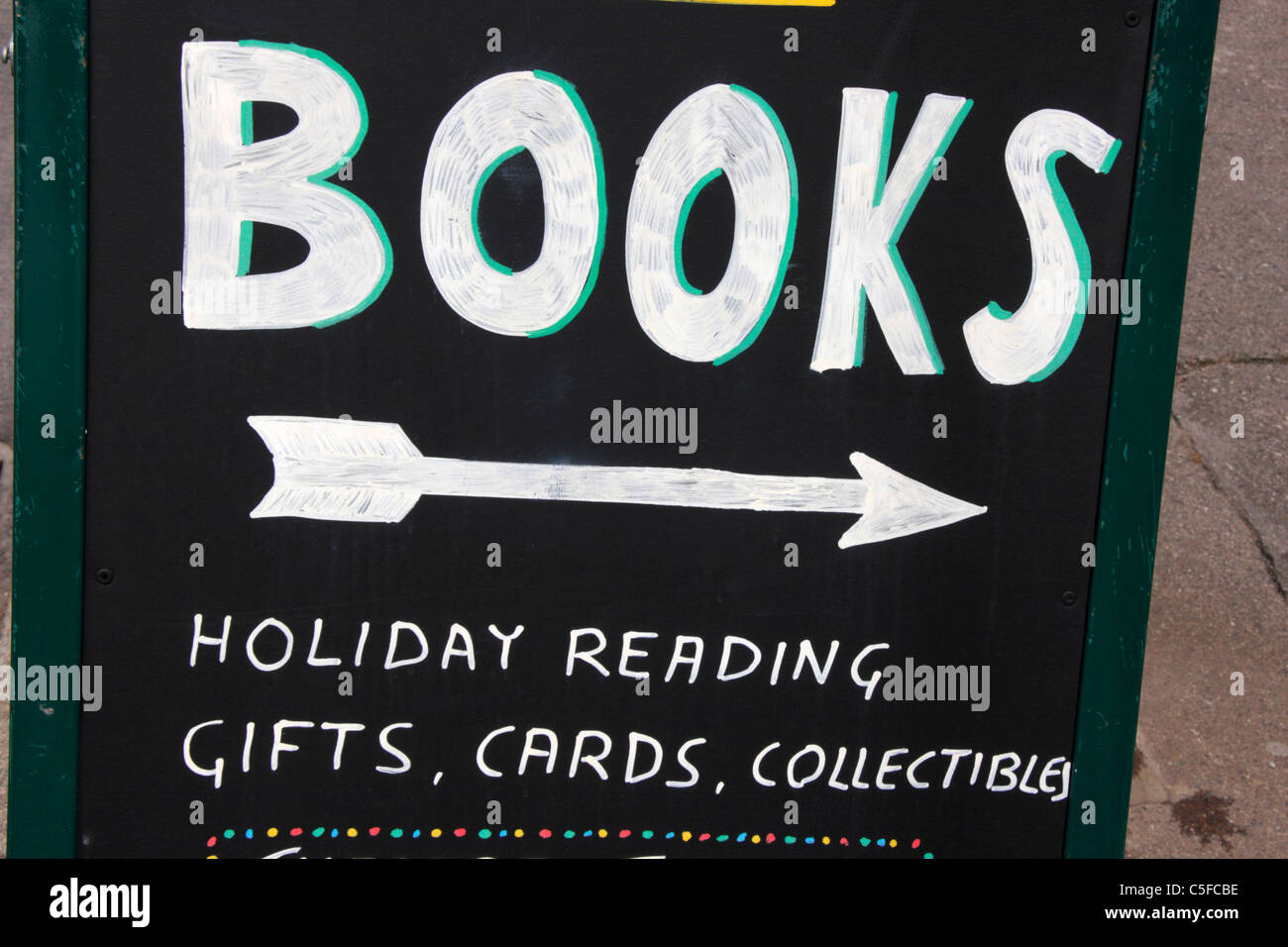 Books sign outside independent bookseller. Stock Photo