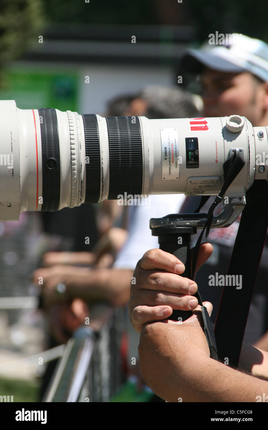photographer with long lens camera Stock Photo Alamy