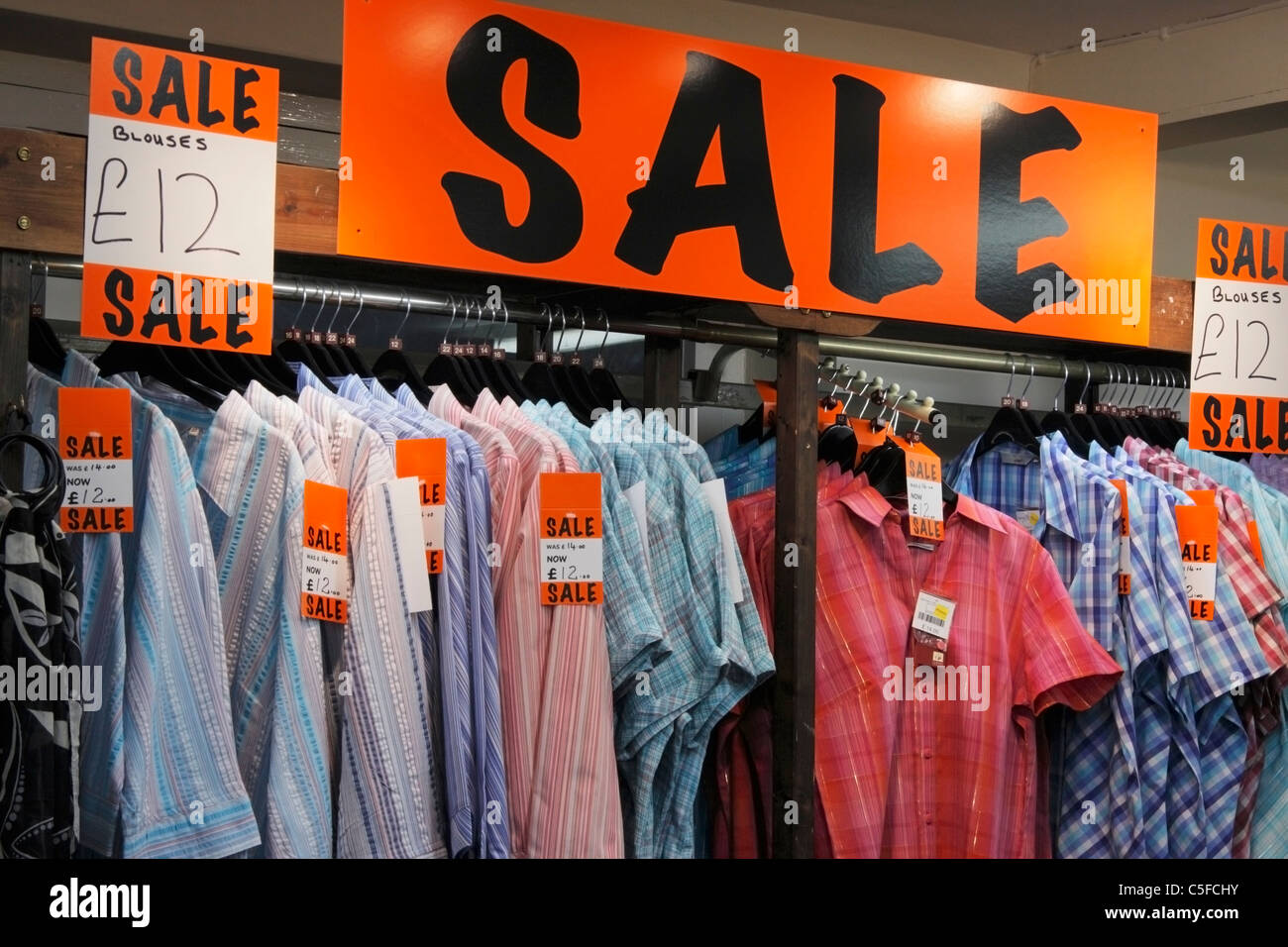 Sale sign in clothes shop Stock Photo Alamy