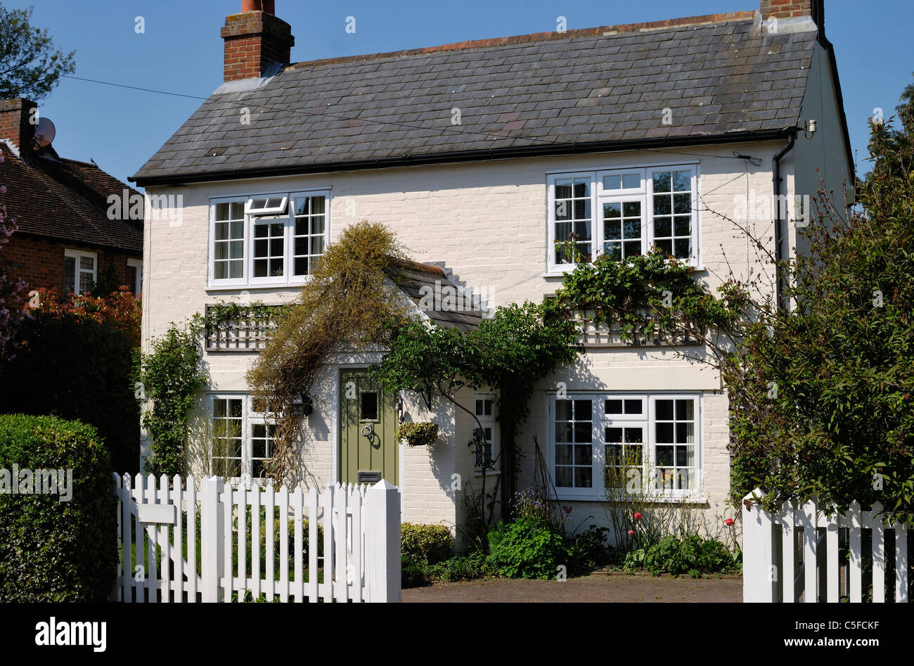 Pretty detached painted brick cottage in the village of Shoreham, Kent, England Stock Photo