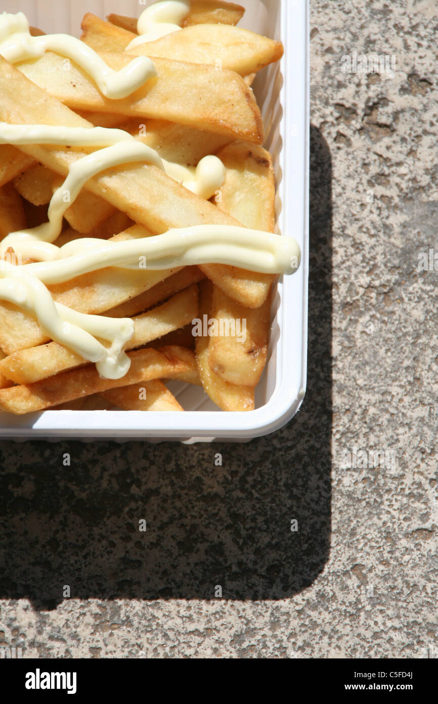 chips with mayonnaise in a tray Stock Photo Alamy