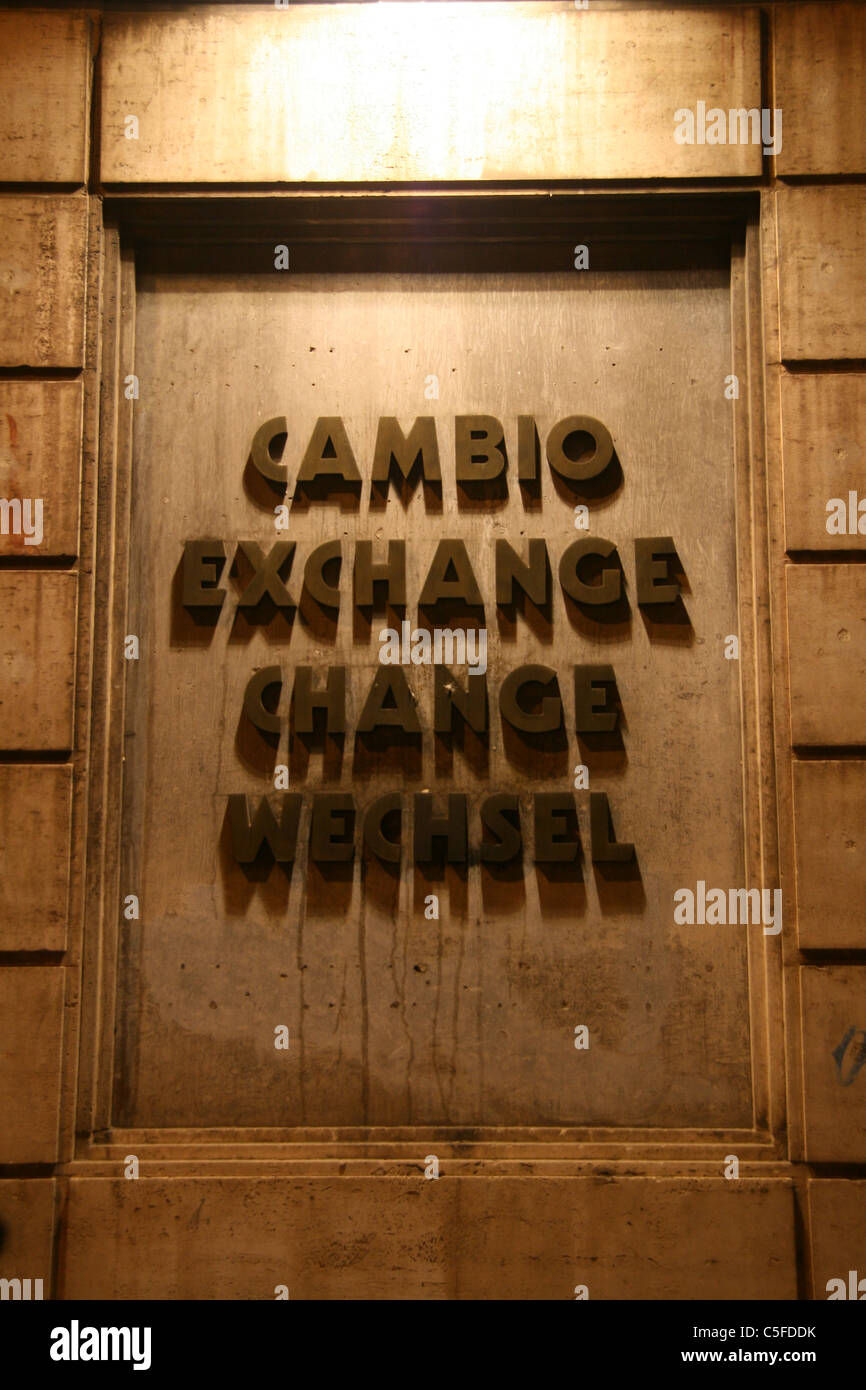 foreign currency exchange change point bank sign notice at night in