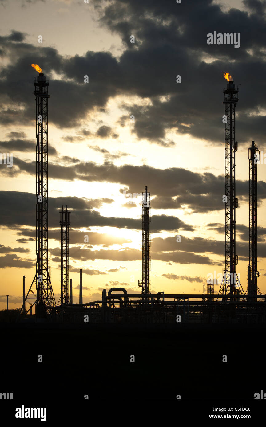 silhouette of oil refinery factory at sunset Stock Photo - Alamy