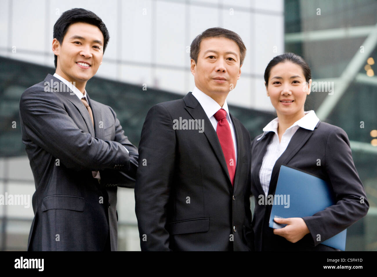 Serious asian business team outdoors hi-res stock photography and ...