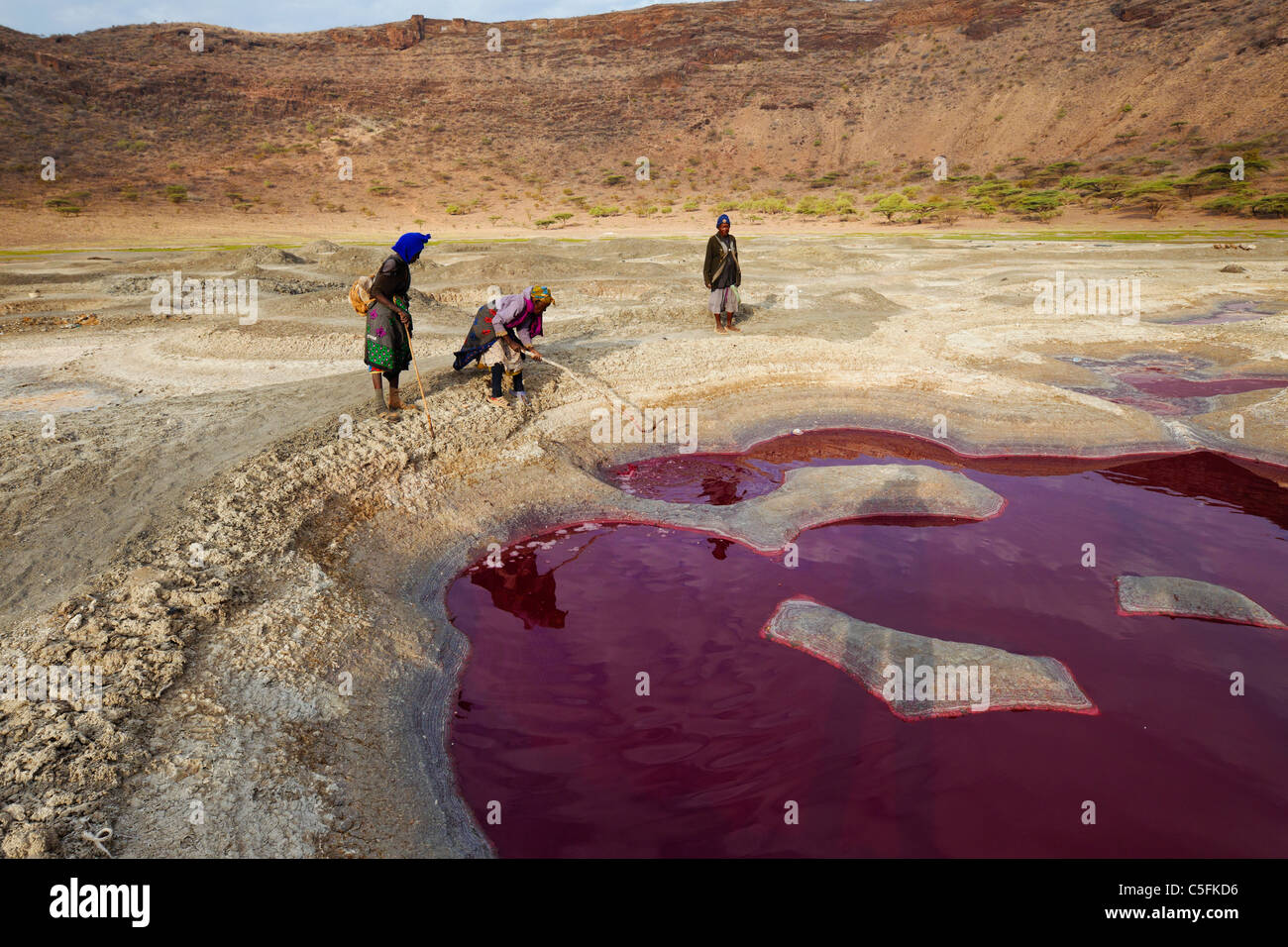 Meru people collecting soda in Magado Crater Nyambeni mountain range,Kenya Stock Photo