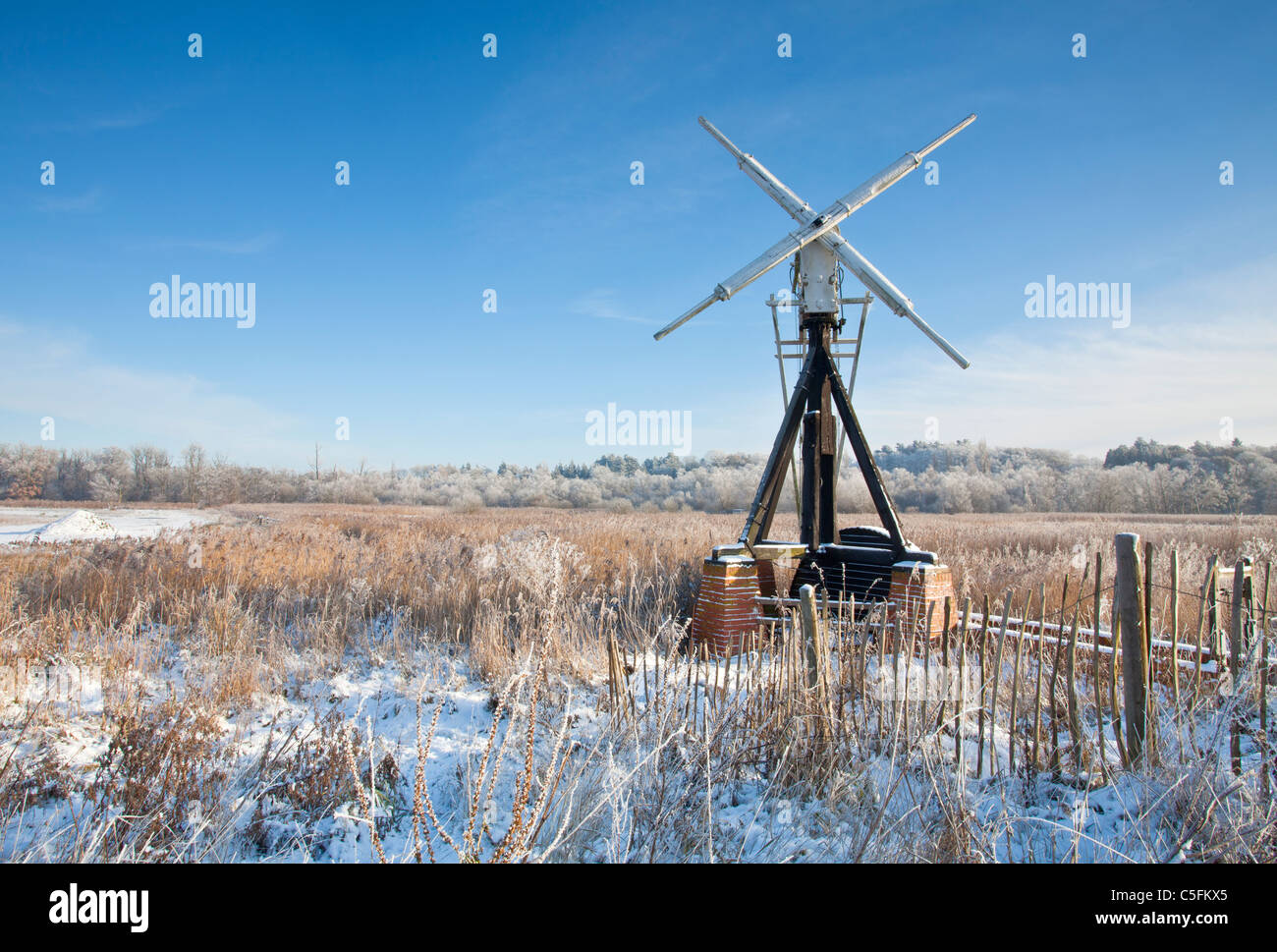 Clayrack open framed skeleton drainage mill on a winters day at How Hill on the Norfolk Broads. Stock Photo