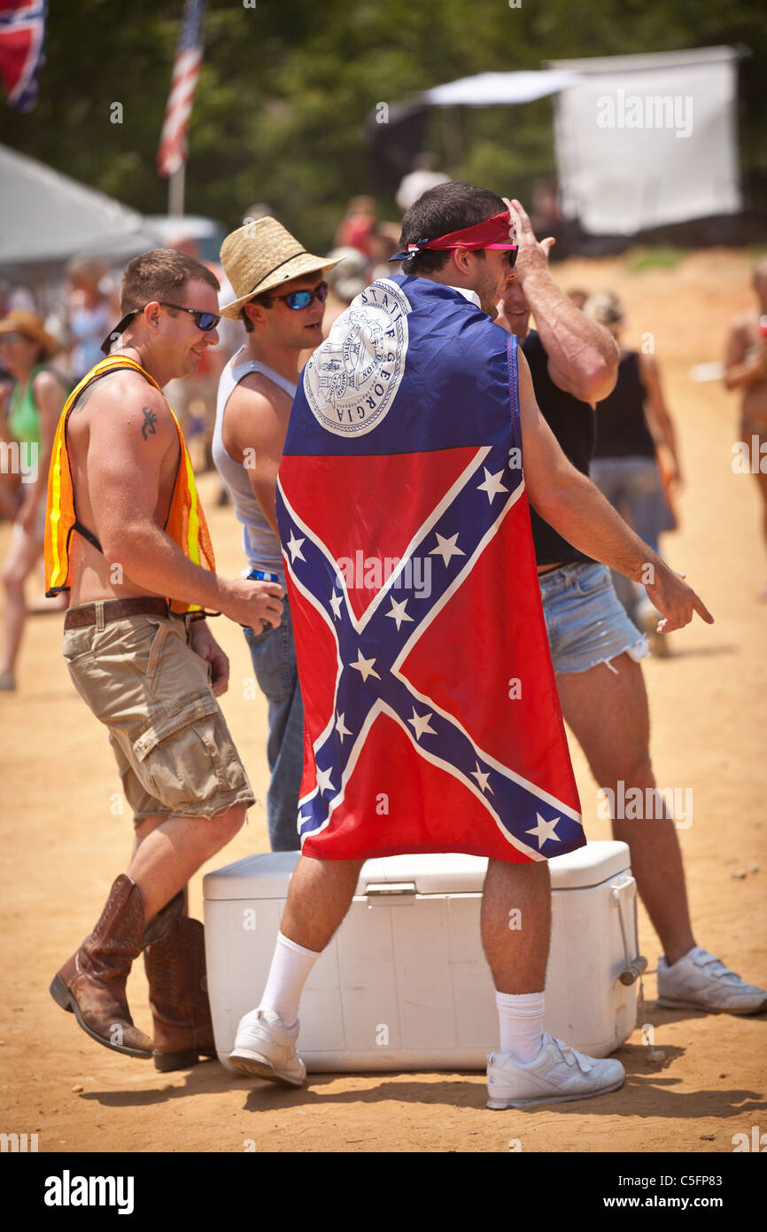 A participant wears a confederate flag during the annual Summer