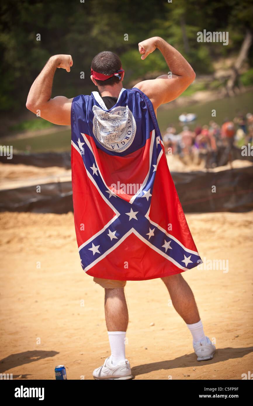 A participant wears a confederate flag during the annual Summer