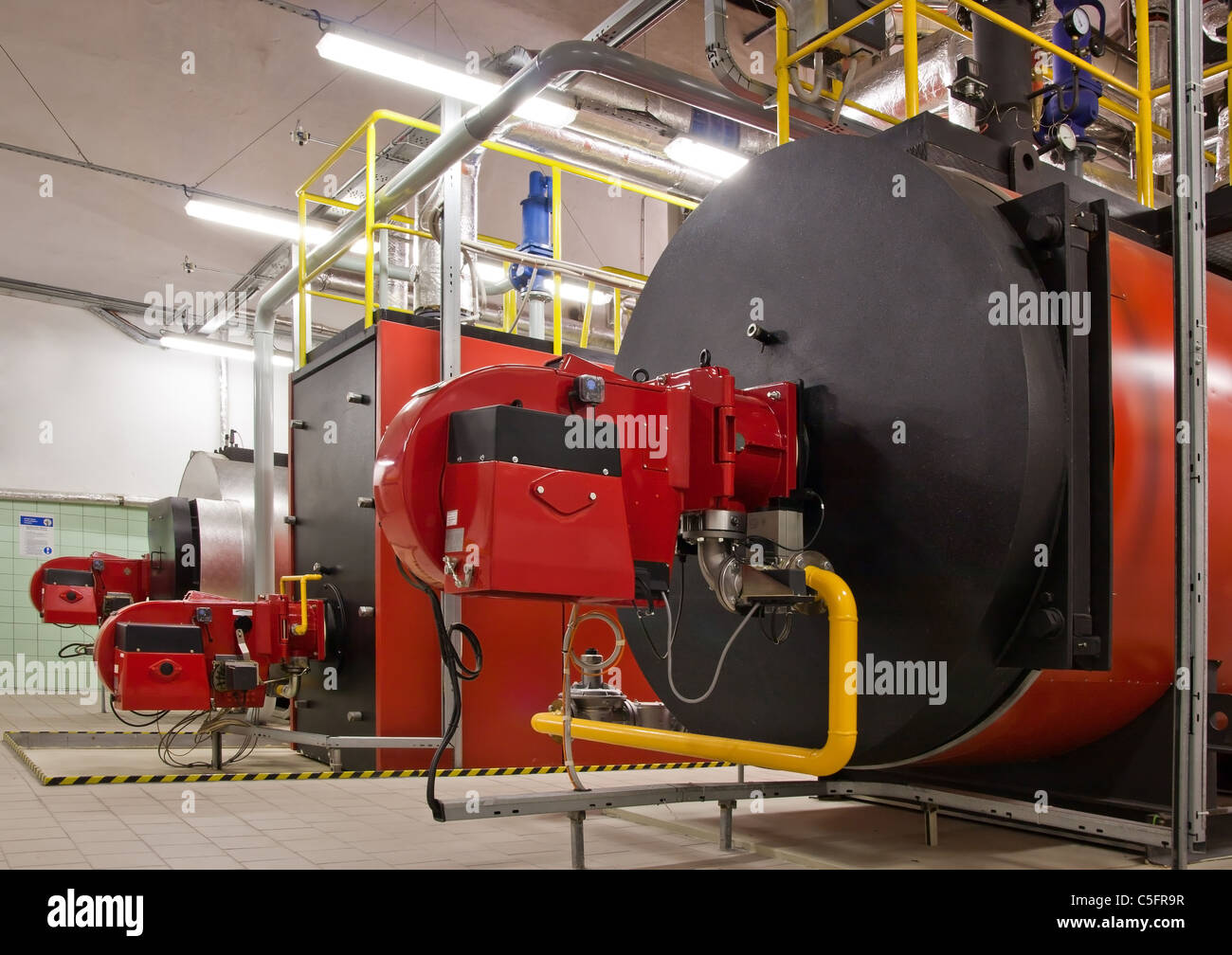 Gas boilers in gas boiler room for steam production Stock Photo