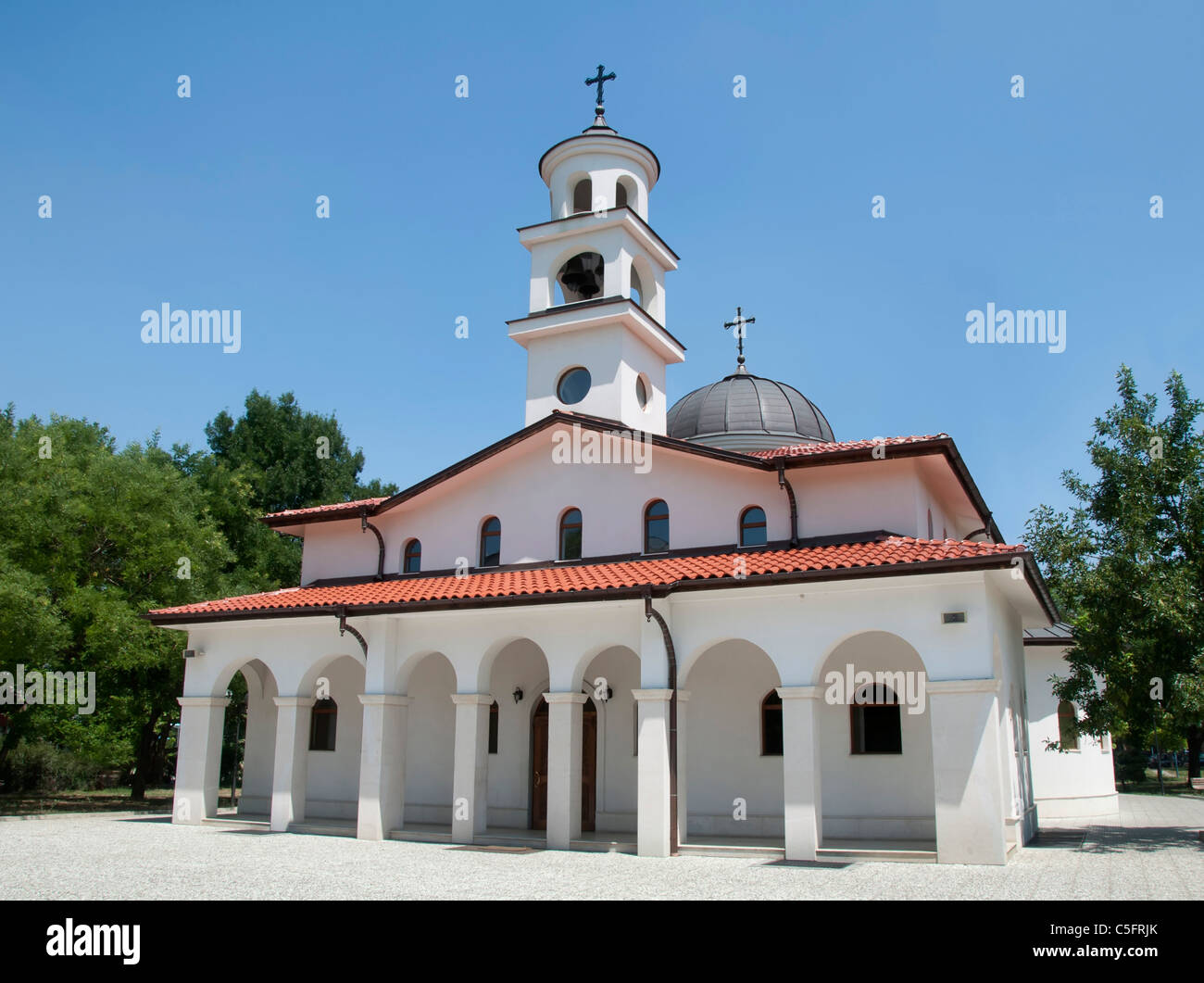 White Orthodox Church with two domes Stock Photo