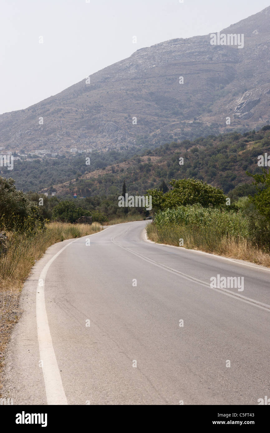 A fairly well maintained road in the mountains near Spili, Crete, Greece. Stock Photo