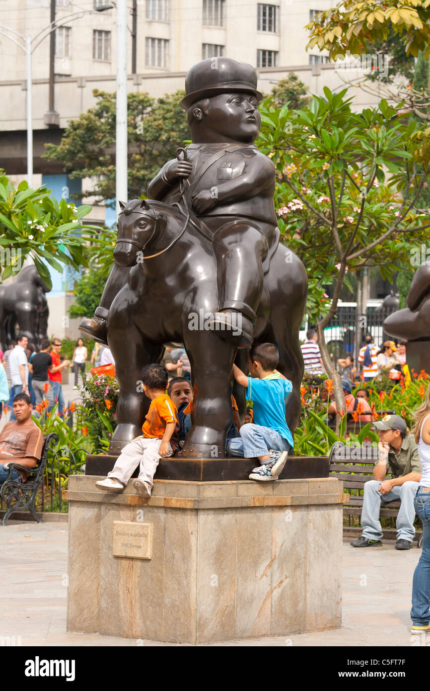 Plaza Botero, a symbol of Medellin, Colombia, and children enjoying their time Stock Photo