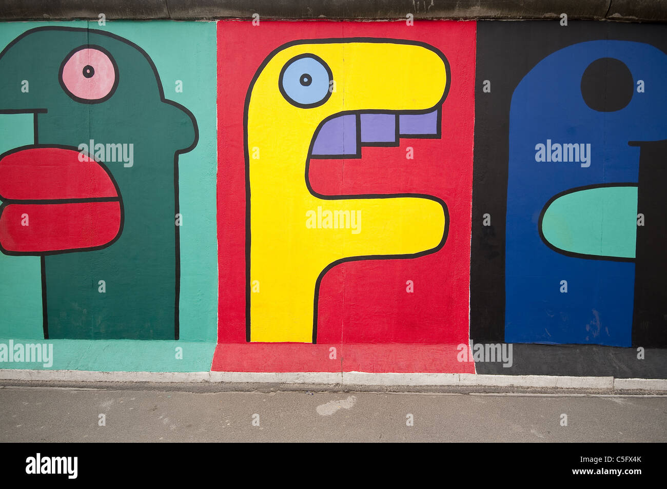 One of the many paintings at the Berlin Wall East Side Gallery, the largest open air gallery in