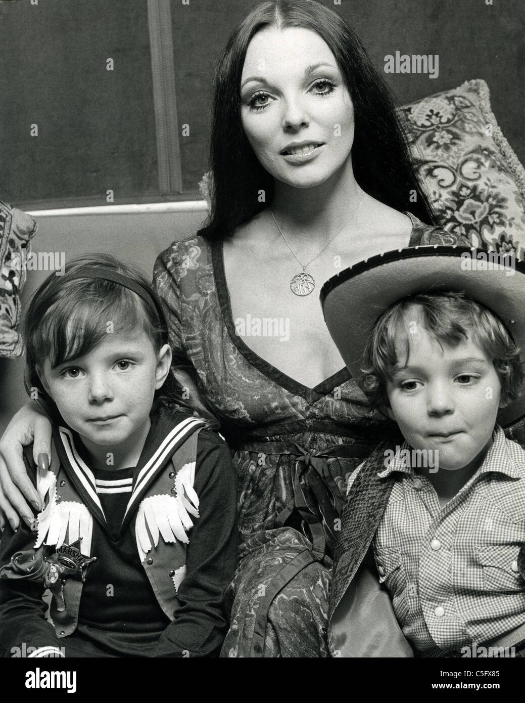 JOAN COLLINS UK film actress in 1971 with daughter Tara and son Sacha by her marriage to Anthony Newley Stock Photo