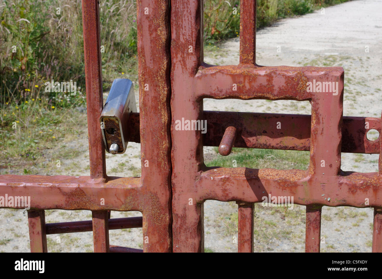 A security lock on a gate Stock Photo - Alamy