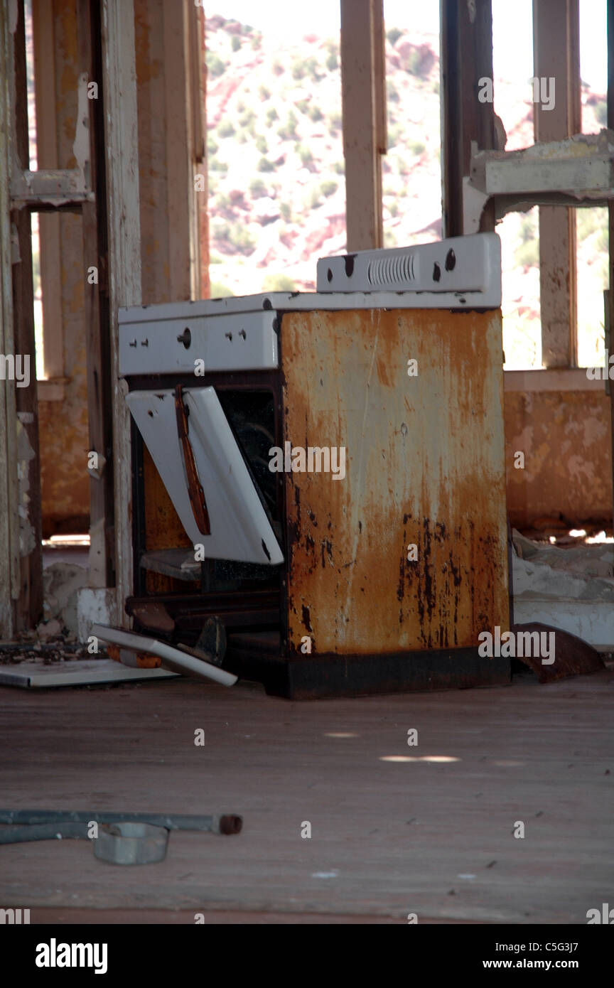 An antique stove sits in the wreckage of an abandoned school house in Cuervo, New Mexico Stock Photo