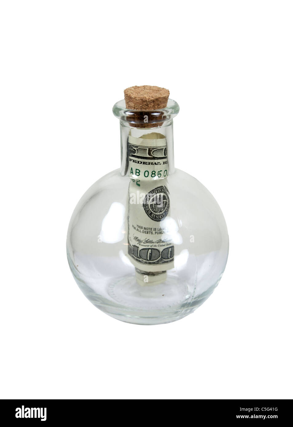 Note in a bottle shown by a onehundred dollar bill in a glass bottle