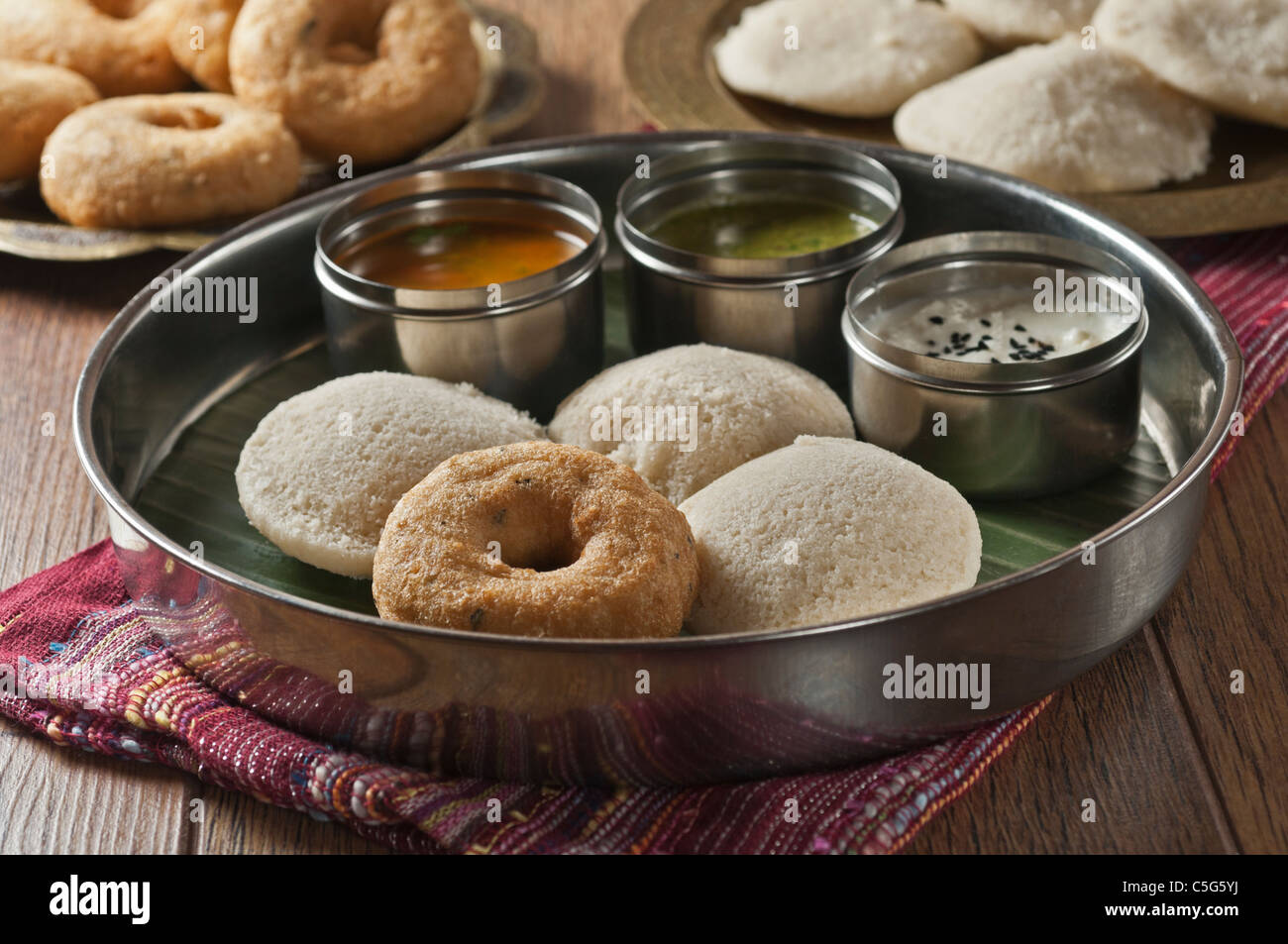 Idly wada. Steamed rice cakes and lentil fritter. South Indian breakfast snack Stock Photo