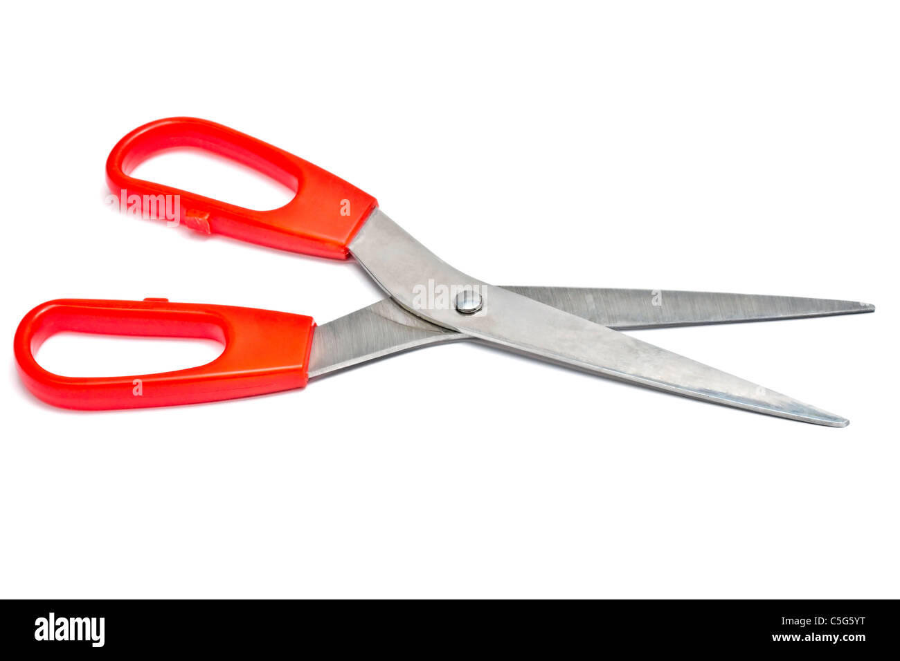 Red handled scissors isolated on white background Stock Photo