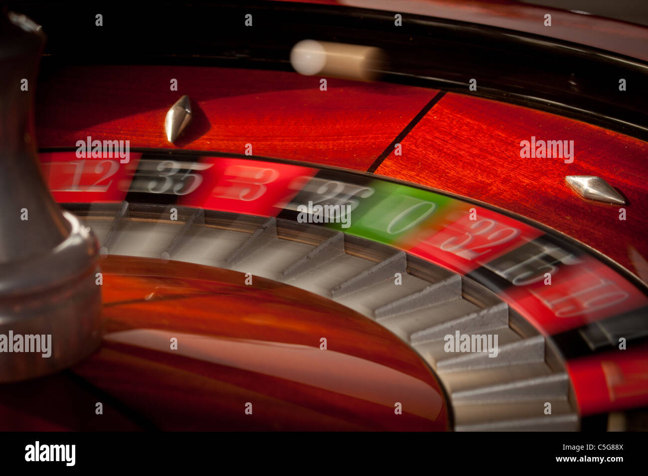 European casino roulette wheel ball in play motion blur Stock Photo Alamy