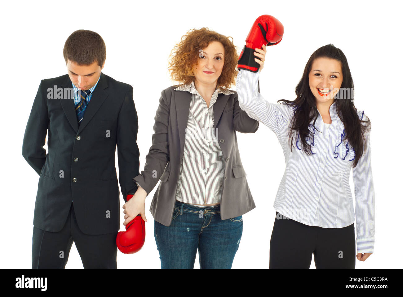 Referee raising the winner hand in two business people competition