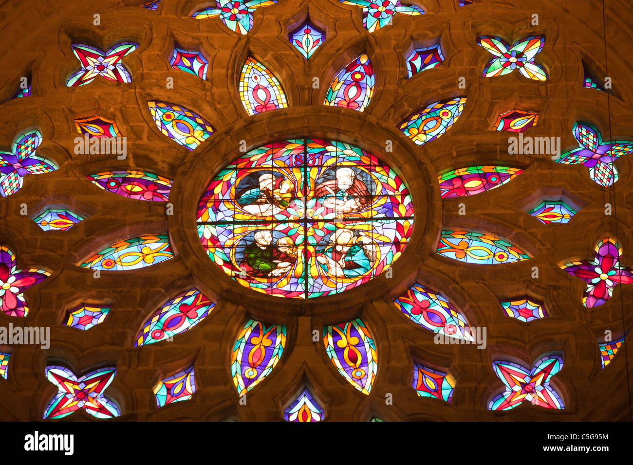 A stained glass window in Seville Cathedral the largest Cathedral in