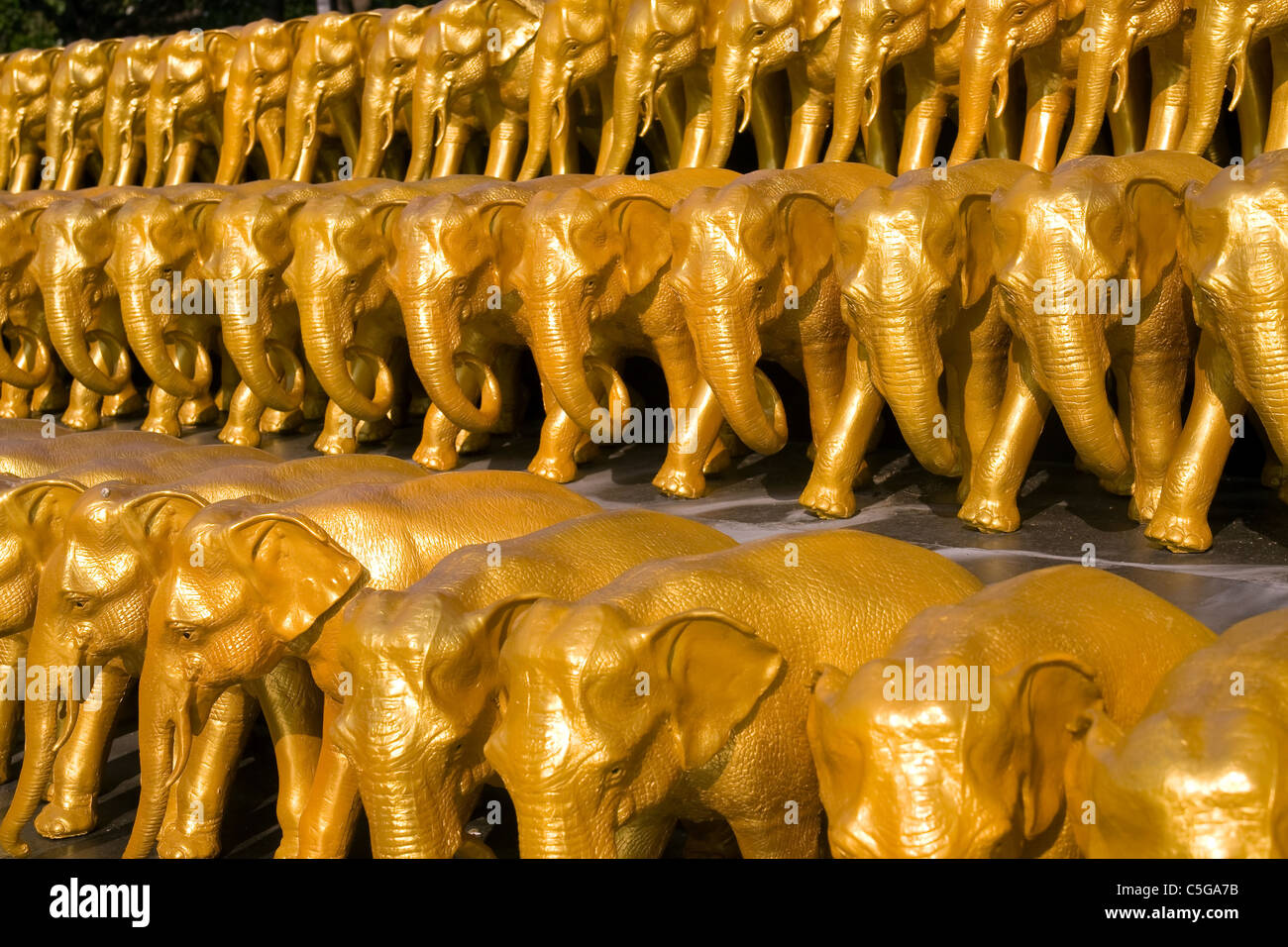 Statues of gold elephants Stock Photo Alamy