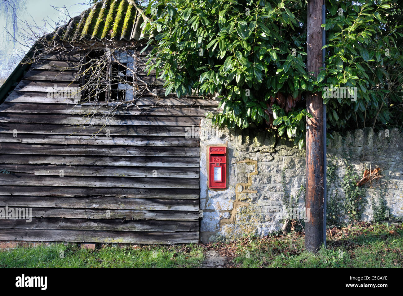 Post box set in old wall Stock Photo - Alamy