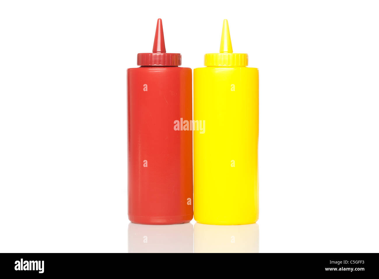 A mustard and ketchup bottle against a white background Stock Photo Alamy