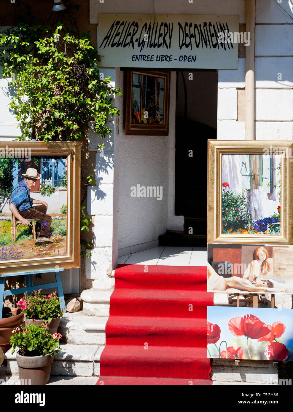 Framed pictures displayed outside art gallery in Mougins, Provence, France Stock Photo