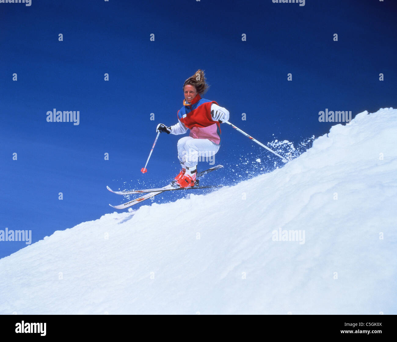 Young woman skier on slopes, Verbier, Canton du Valais, Switzerland Stock Photo