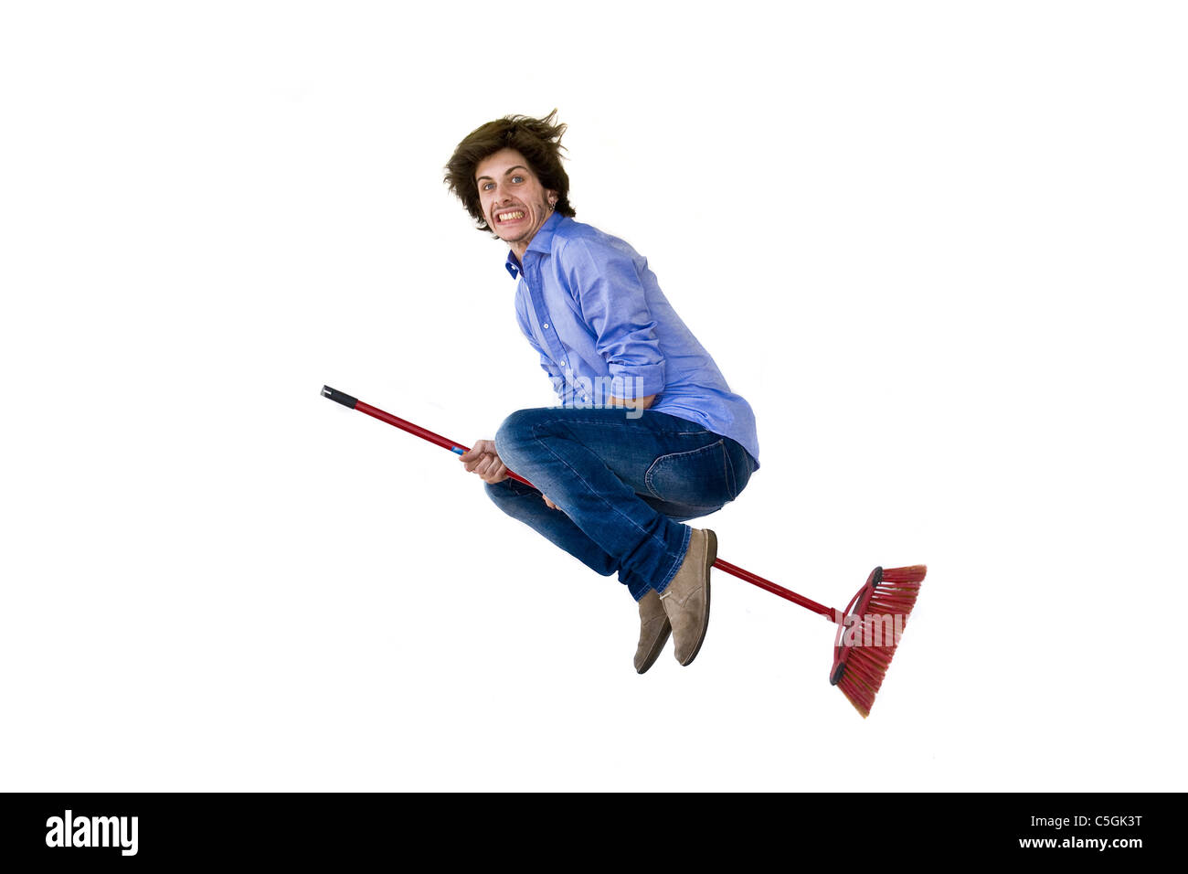 Man flying broomstick hires stock photography and images Alamy