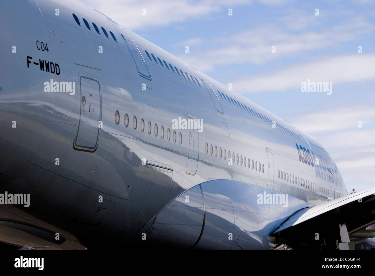 Reflections in the fuselage of an Airbus A380 passenger aircraft at the Farnborough Air Show Stock Photo