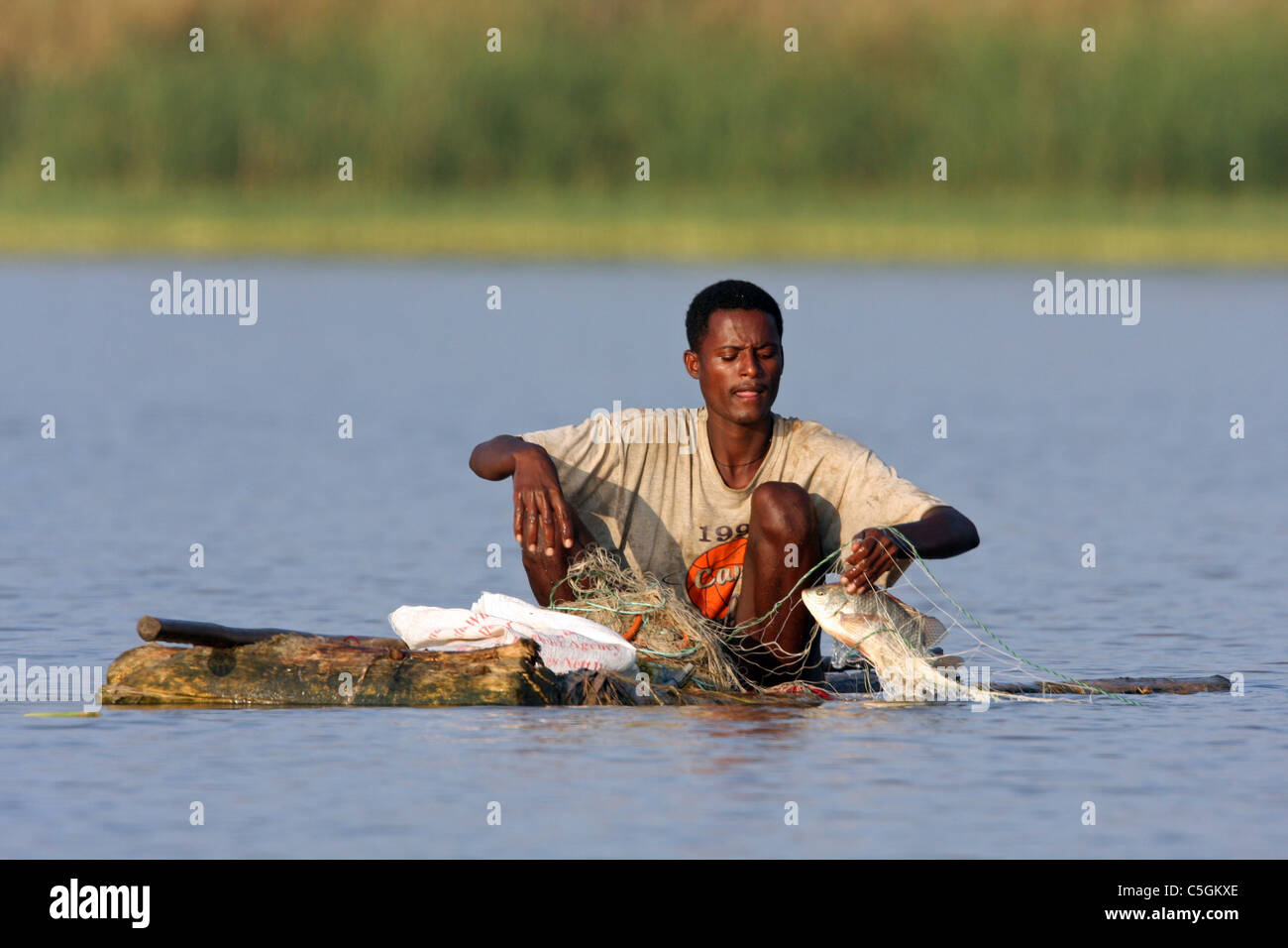 African subsistence fisherman hi-res stock photography and images - Alamy