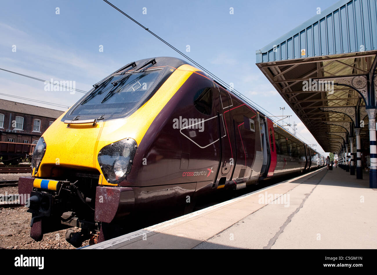 Voyager train in Crosscountry trains livery at a railway station in England. Stock Photo