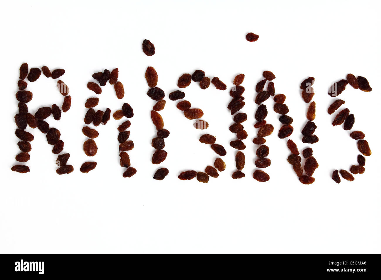 the word RAISINS written with raisins , conceptual image Stock Photo Alamy