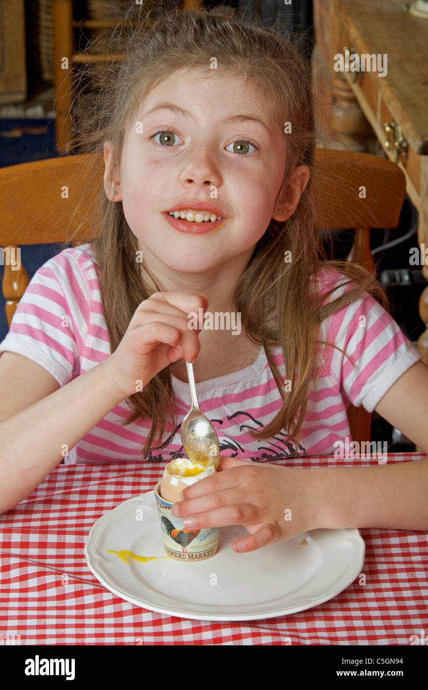 Young girl eating cooked breakfast hi-res stock photography and images ...