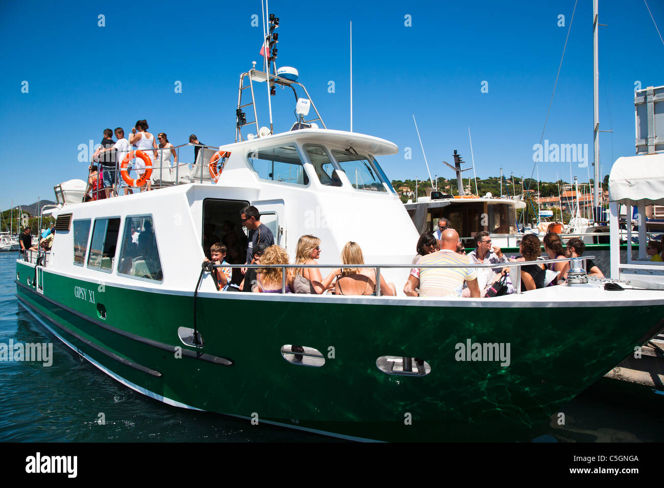 Ferry taking people to Saint Tropez from Sainte Maxime, Provence, France Stock Photo