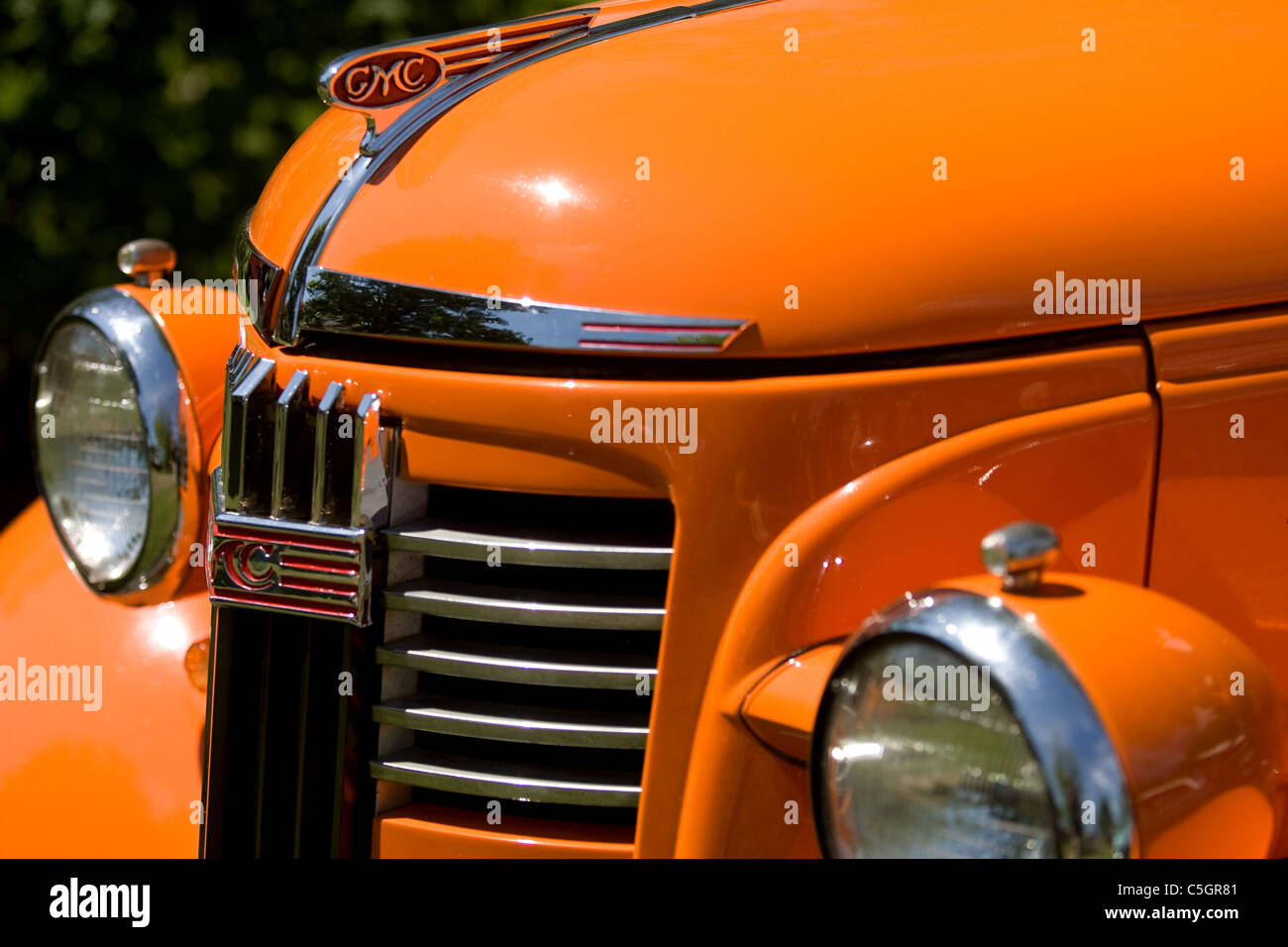 The front grill and headlights of a vintage General Motors Truck. Stock Photo
