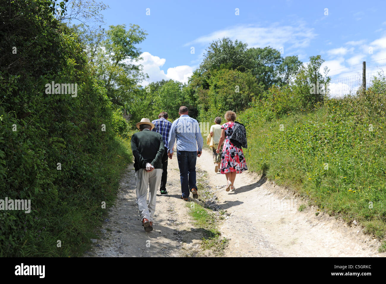 Walking on a rough country lane or path in countryside near Arundel in west Sussex UK Stock Photo
