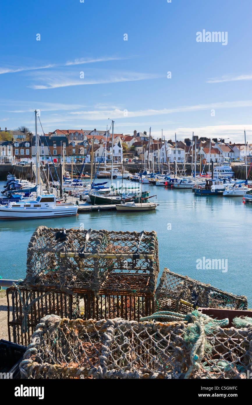 Lobster pots on the harbour in the picturesque fishing village of Anstruther, East Neuk, Fife, Scotland, UK Stock Photo