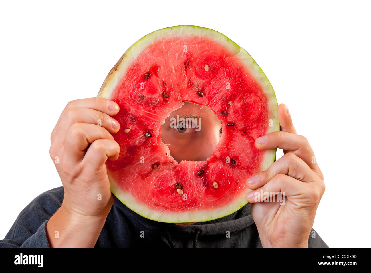 Eye looking through watermelon slice isolated on white Stock Photo