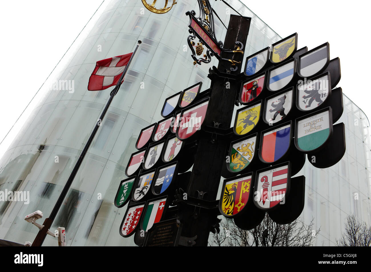 Cantonal tree with emblems of Swiss cantons in Leicester Square in London Stock Photo