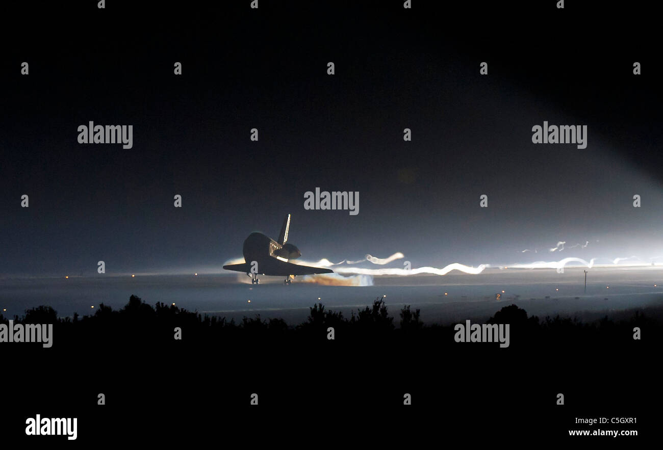 STS-135 Space Shuttle Atlantis touches down on the last ever shuttle mission.  Stock Photo