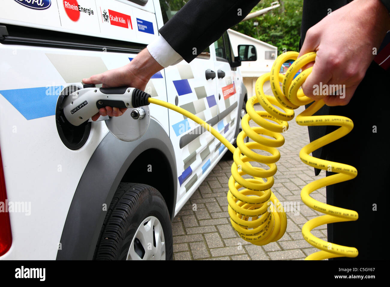 Electric vehicle, van. Powered by electricity. Charging the batteries