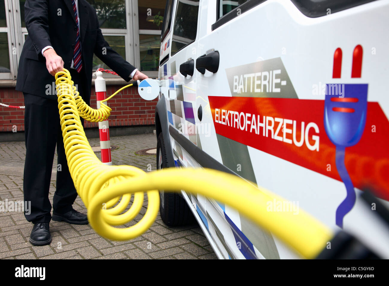 Electric vehicle, van. Powered by electricity. Charging the batteries