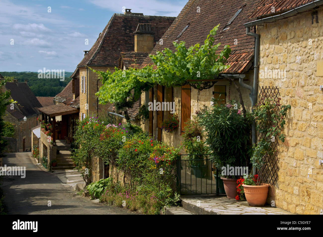 Stone houses in Rue de Guet Domme Dordogne Aquitaine France Stock Photo