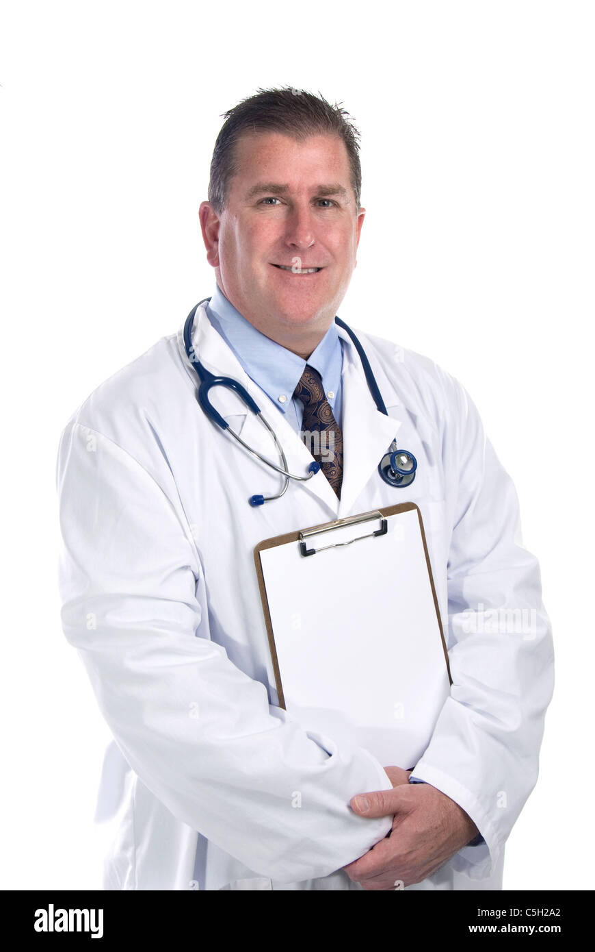 A male physician is ready to make rounds and take notes. Clip board is available for user to place custom copy. Stock Photo