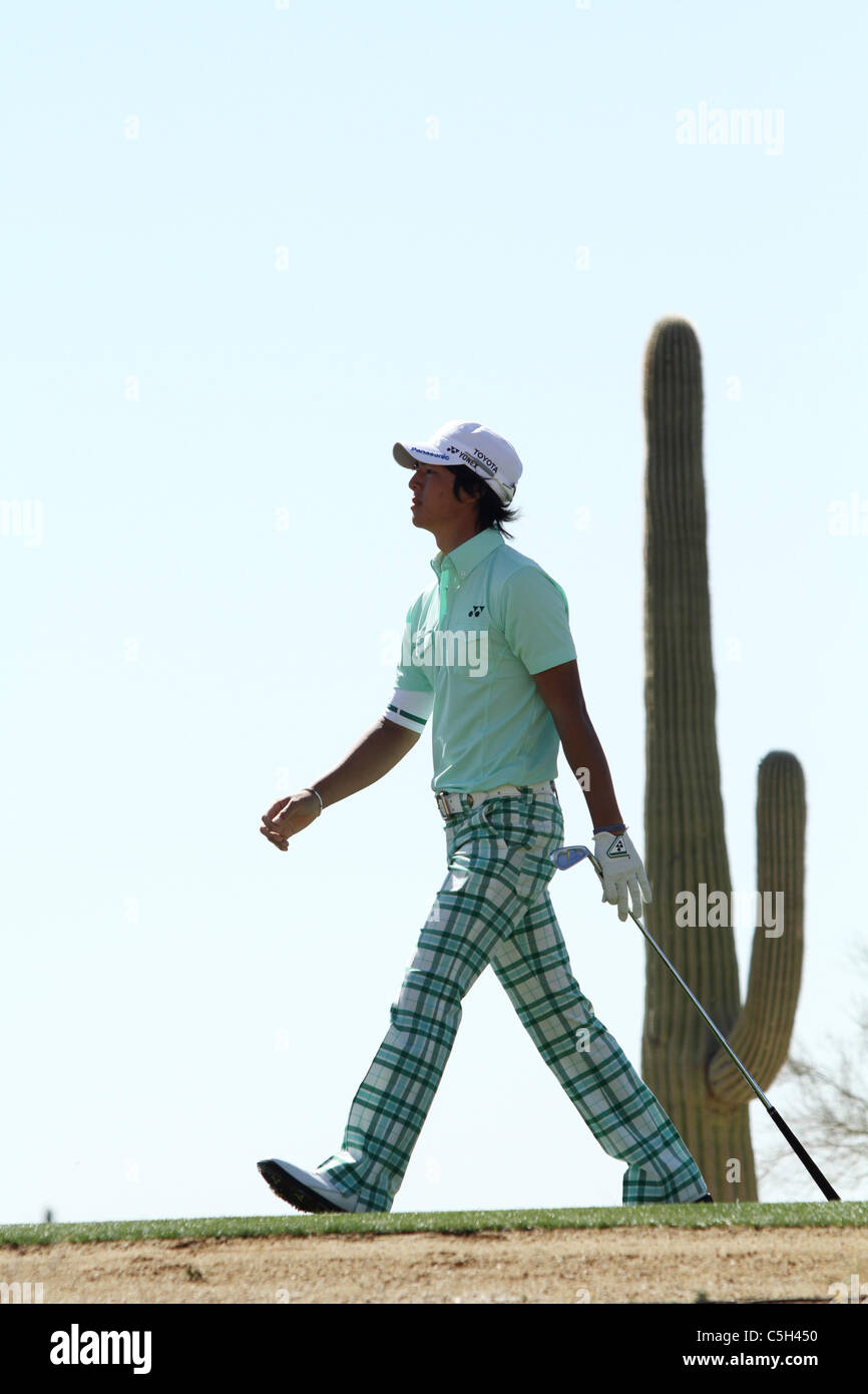 Ryo Ishikawa of Japan in action during the first round of the WGC-Accenture Match Play Championship. Stock Photo